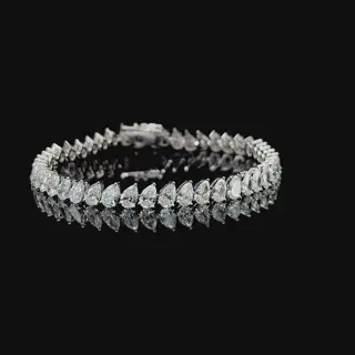 Теннисный браслет с бриллиантами огранки «Груша», 13,5 ct